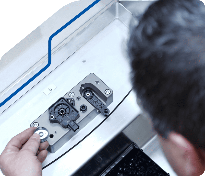Edge Automation Engineer overlooking equipment